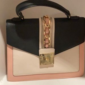 Pre- owned Aldo’s designer handbag.
